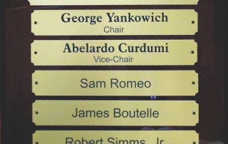 Board of Directors Sign on Rosewood Plaque